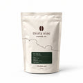The Dales 250g Smooth Coffee Beans — cream coffee bag on white with a soft shadow