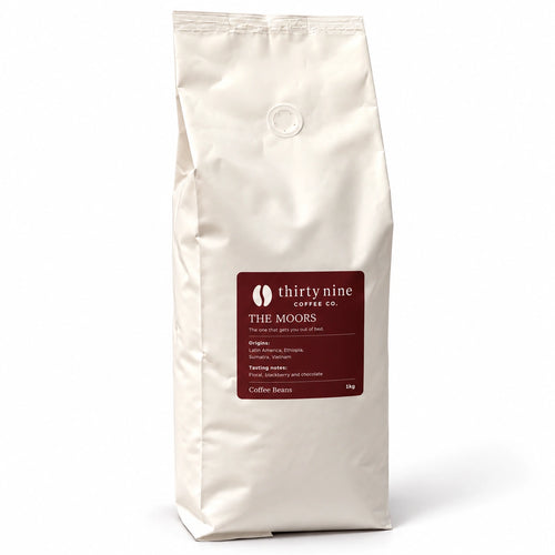 The Moors 1kg Espresso Coffee Beans — cream coffee bag on white with a soft shadow
